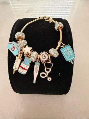 Gold-Tone Medical Bracelet with Blue Accents